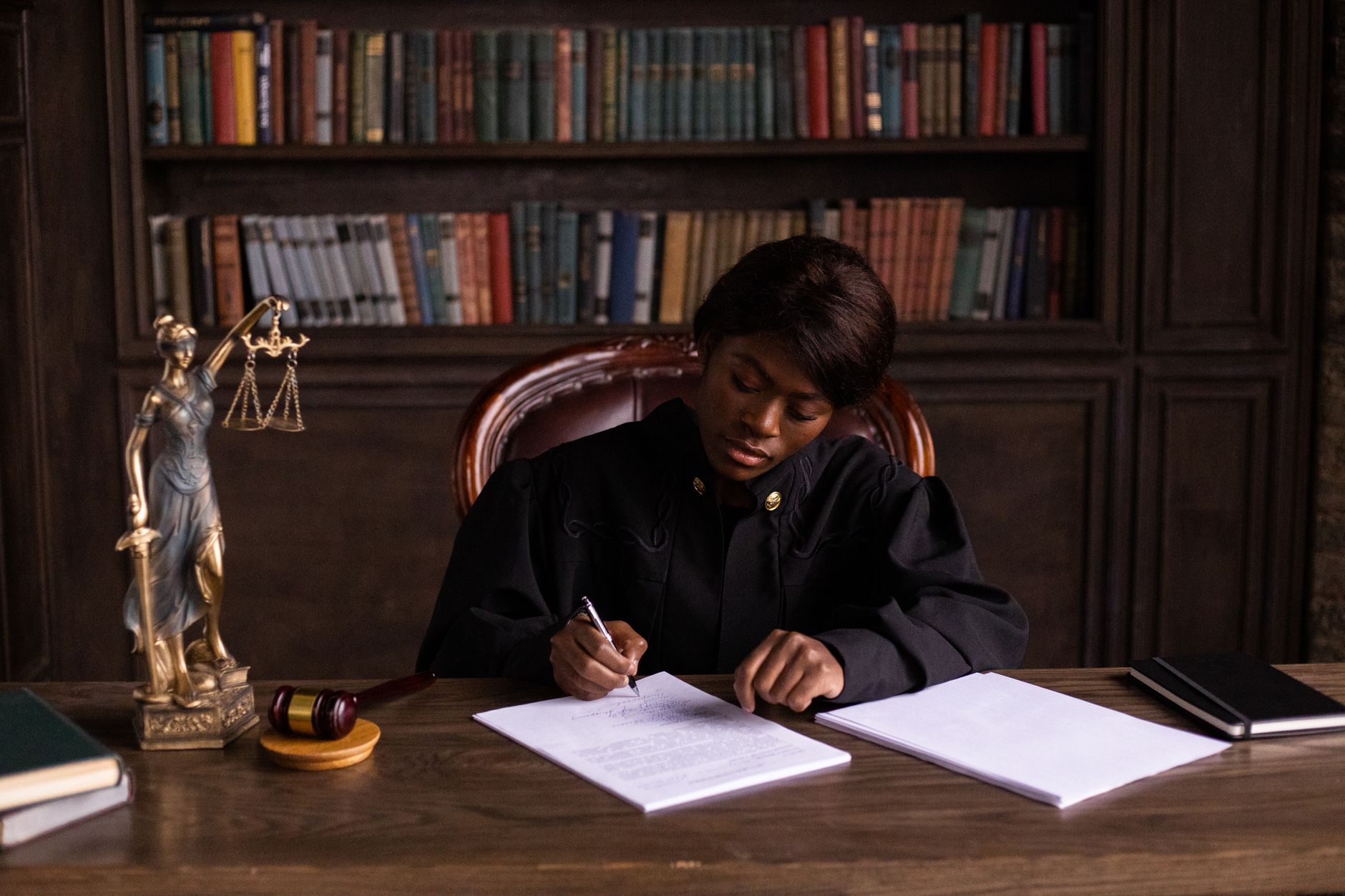 a lawyer working at a laptop at home