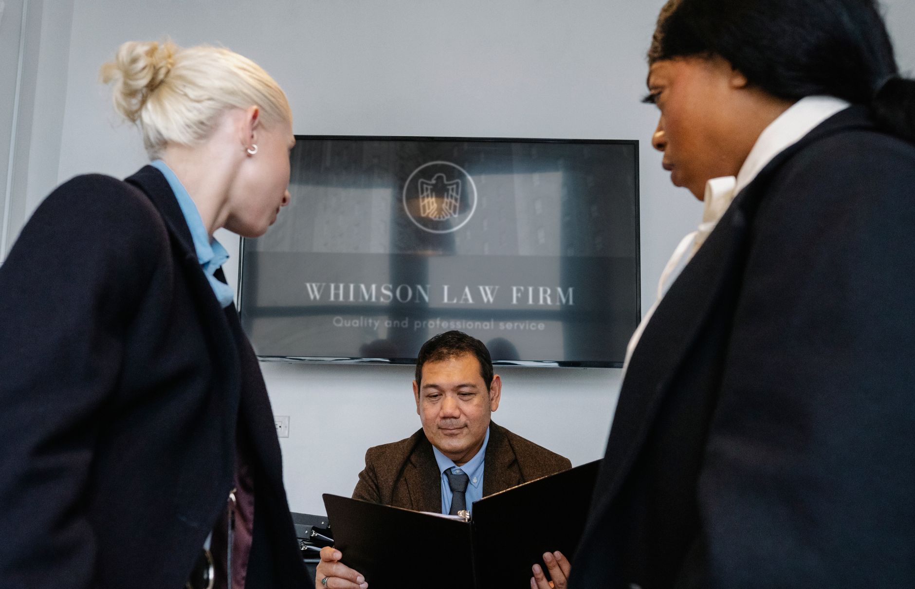 a legal team working in an office