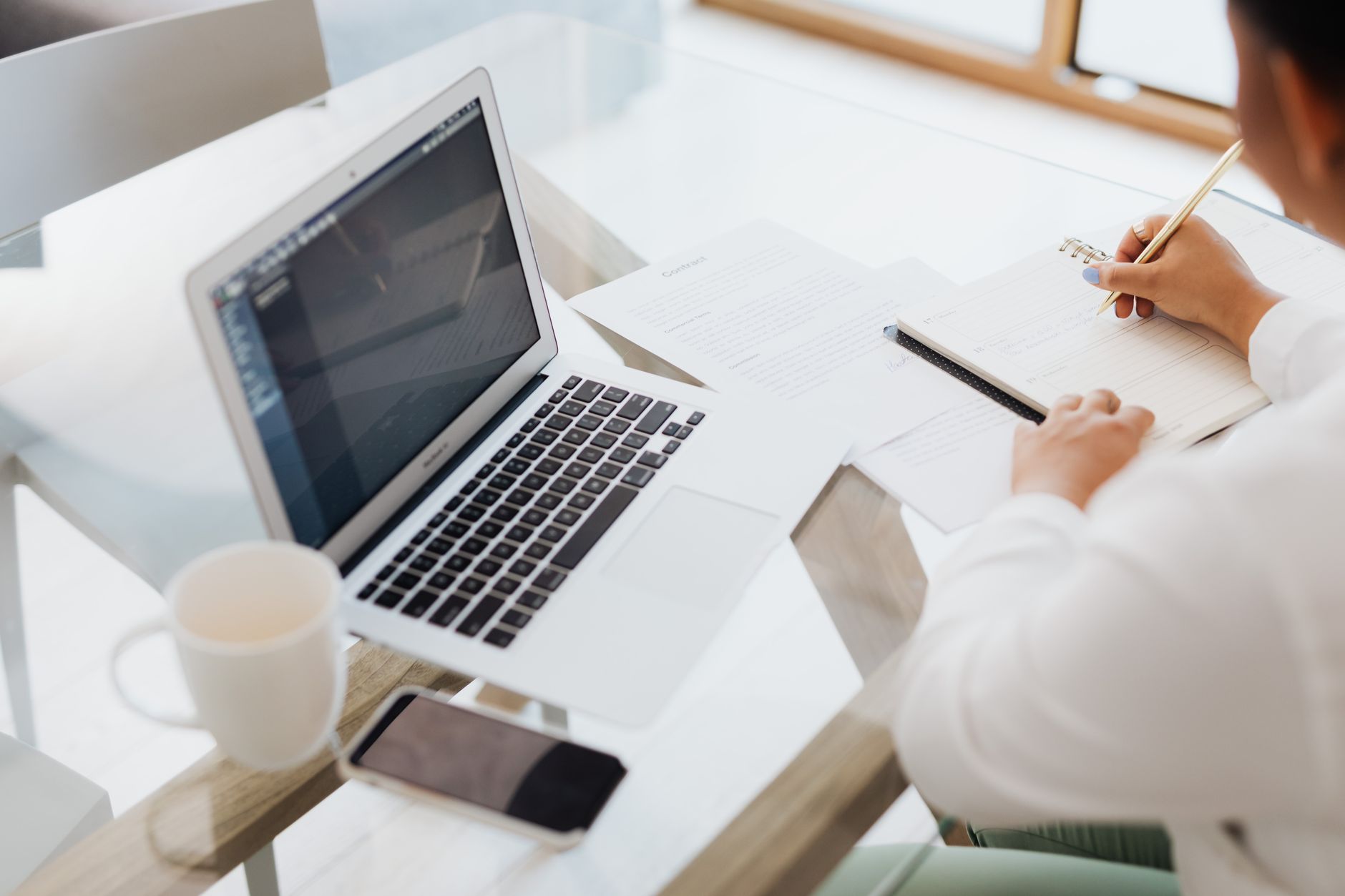 a trademark attorney working remotely at a laptop